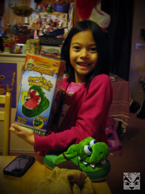 I let her open Emma's present, a pair of Stompeez!