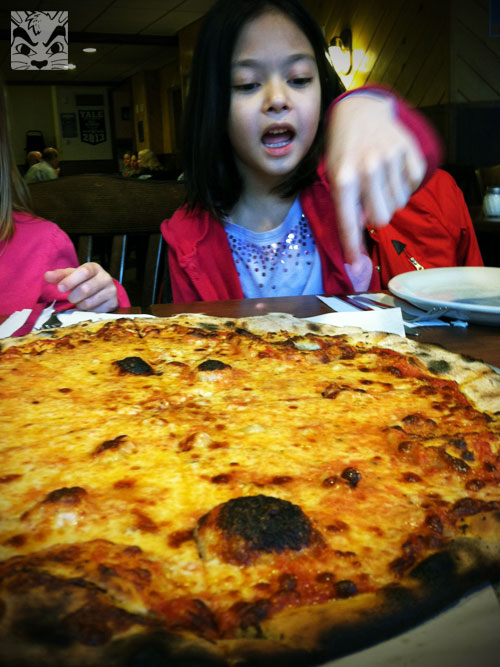 Sienna picking out her slice.