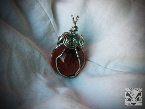 From another class on creativebug.com on caging pendants. Not bad for the first try but do not more practice! The sphere inside is the resin heart one that I will show later in the post.