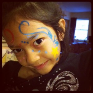 Attempting to paint her fairy face!